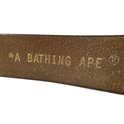 A Bathing Ape (BAPE) - brown leather belt gold pendant