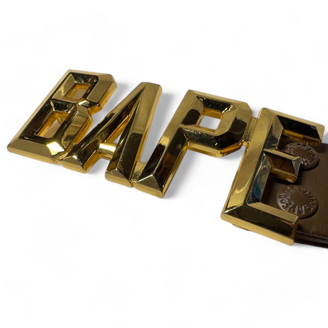 A Bathing Ape (BAPE) - brown leather belt gold pendant