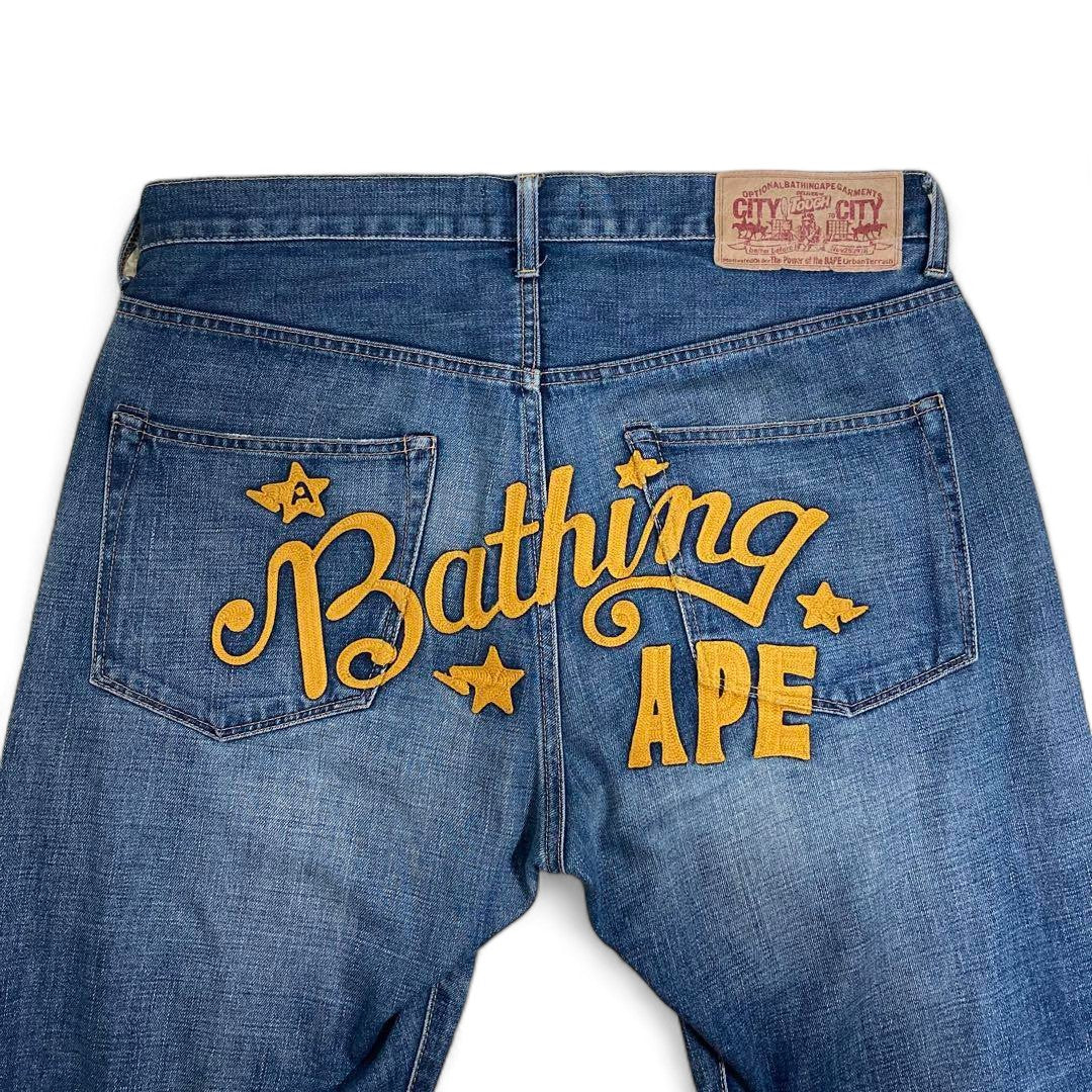 A Bathing Ape (BAPE) - L embroidered baggy jeans blue backprint denim